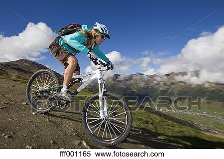 riding a bike downhill