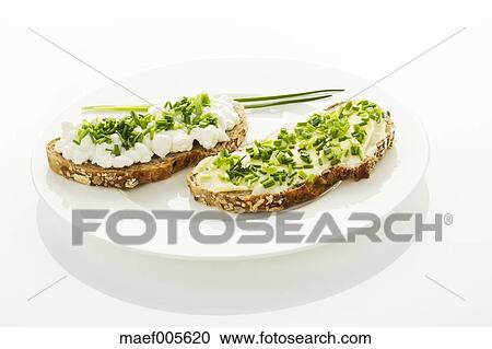 Cottage Cheese Butter And Chives On Whole Grain Bread Close Up