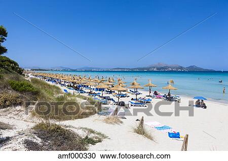 Spain Mallorca View Of Tourists In Playa De Muro Beach Stock