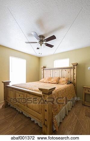 Usa Texas Rustic Bedroom Interior With Ceiling Fan Stock Image