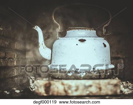 Old Kettle At Fireplace Stock Photo Degf000119 Fotosearch