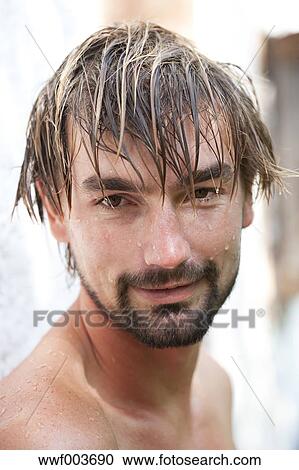 Portrait Of Smiling Man With Wet Face And Hair Stock Image