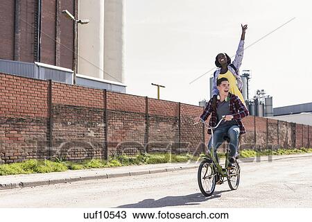 standing on a bike