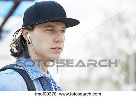 person wearing baseball cap