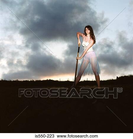 Caucasian, clouds, digging, female View Large Photo Image Stock Image - Caucasian, clouds, digging, female. Fotosearch