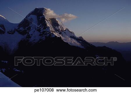 Stock Photo - blue, alpine, black, background, America, cloud, adventure. Fotosearch