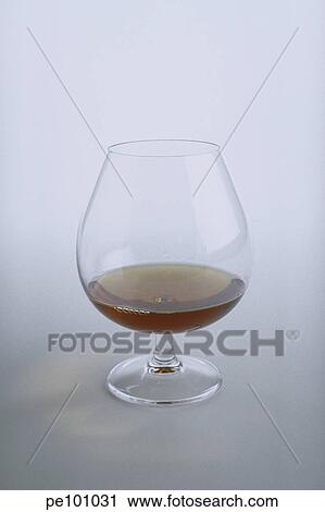 Stock Image - beverage, brown, cognac, dine, drink, glass, gray. Fotosearch