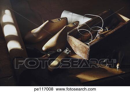 Stock Photo - arrangement, cobbler, boot, assorted, antique. Fotosearch