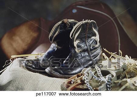 Stock Photo - boot, shoes, horse, clothing, assorted. Fotosearch