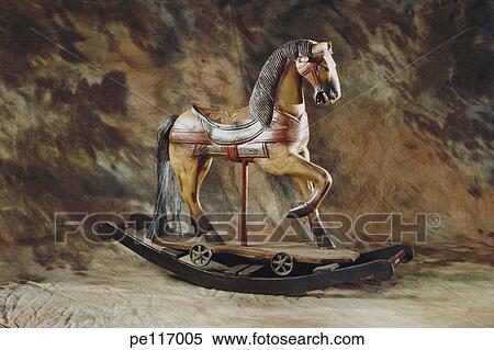 Stock Photography - child, still life, horse, antique. Fotosearch