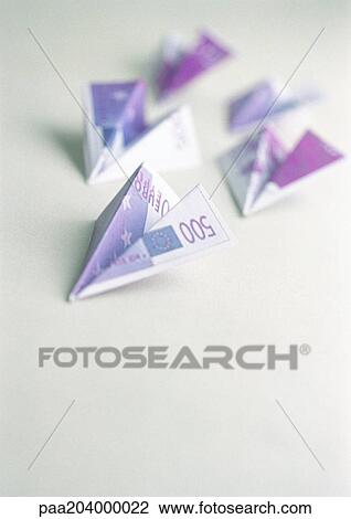 Five five-hundred-euro bills, folded into paper airplanes. View Large Photo Image Stock Image - Five five-hundred-euro bills, folded into paper airplanes.. Fotosearch