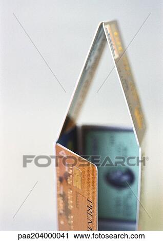 Stock Image - House of credit cards, close-up. Fotosearch