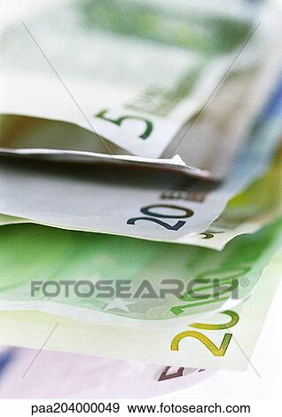 Stack of euro bills, close-up View Large Photo Image Stock Photo - Stack of euro bills, close-up. Fotosearch