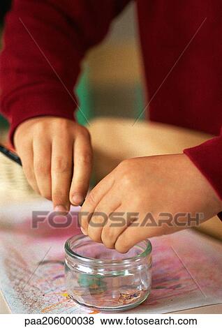 Children's hands sharpening pencil View Large Photo Image Stock Photo - Children's hands sharpening pencil. Fotosearch
