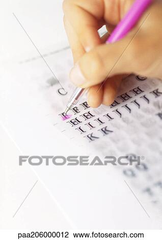Hand using pen on rub-off letters View Large Photo Image Stock Image - Hand using pen on rub-off letters. Fotosearch