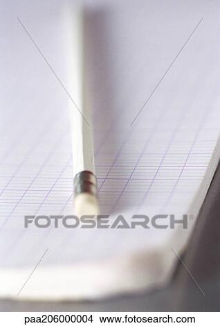 Picture - Notebook and pencil, close-up. Fotosearch