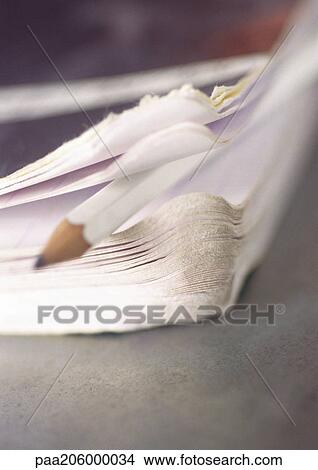 School book and pencil, close-up. View Large Photo Image Picture - School book and pencil, close-up.. Fotosearch