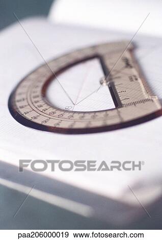 Semicircular protractor on notebook View Large Photo Image Stock Photo - Semicircular protractor on notebook. Fotosearch