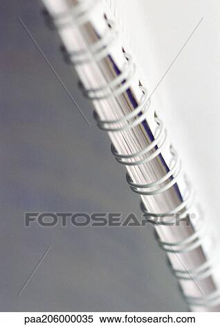 Spiral binding on notebook, close-up View Large Photo Image Stock Photography - Spiral binding on notebook, close-up. Fotosearch