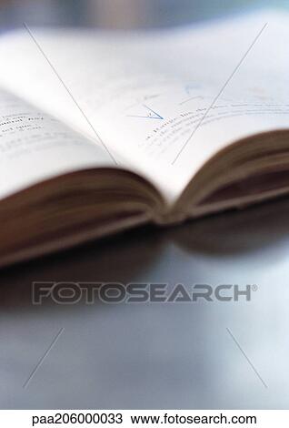 Stock Image - Textbook, close-up. Fotosearch
