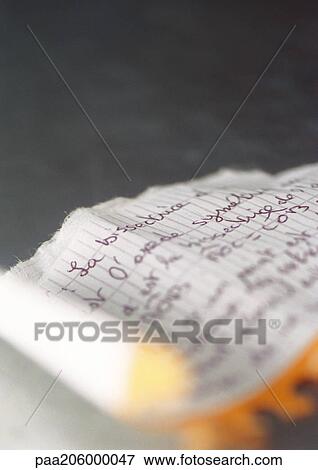 Torn page from notebook, close-up View Large Photo Image Stock Photo - Torn page from notebook, close-up. Fotosearch