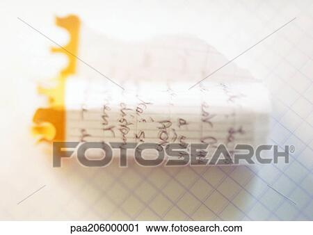 Stock Image - Torn page from school notebook, close-up. Fotosearch