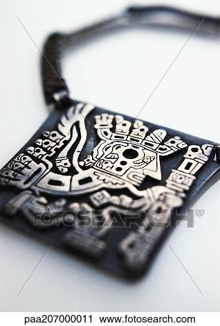 Carved necklace, close-up View Large Photo Image Stock Image - Carved necklace, close-up. Fotosearch