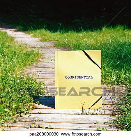 Stock Image - File on wooden walkway. Fotosearch