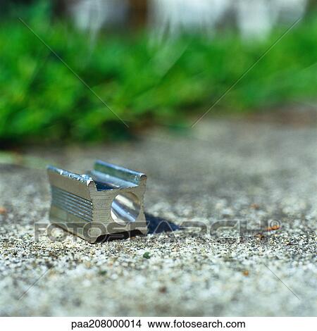 Pencil sharpener on ground. View Large Photo Image Picture - Pencil sharpener on ground.. Fotosearch