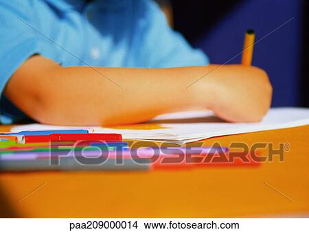 Child drawing in coloring book, close-up. View Large Photo Image Picture - Child drawing in coloring book, close-up.. Fotosearch