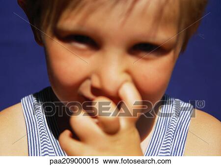 Child with finger in nose, close-up. View Large Photo Image Stock Photography - Child with finger in nose, close-up.. Fotosearch