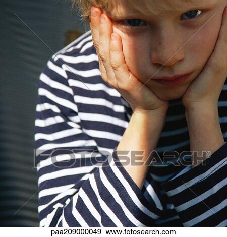 Child with head in hands. View Large Photo Image Stock Photo - Child with head in hands. . Fotosearch