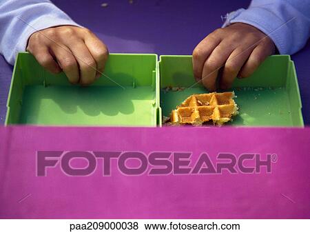 Childs hands and a half eaten waffle. View Large Photo Image Stock Photo - Childs hands and a half eaten waffle.. Fotosearch