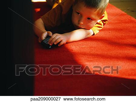 Little boy with remote control View Large Photo Image Stock Photo - Little boy with remote control. Fotosearch