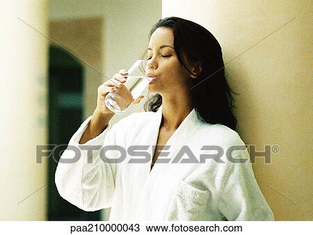 Woman drinking water. View Large Photo Image Stock Image - Woman drinking water. . Fotosearch