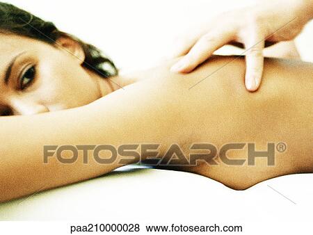 Stock Photo - Woman having massage, close-up.. Fotosearch