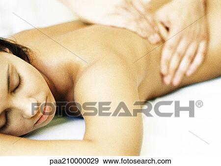 Stock Photo - Woman having massage, close-up.. Fotosearch