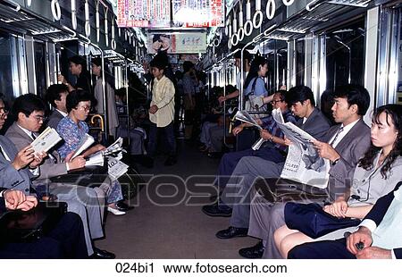 Stock Image - Commuters in the Metro Japan. Fotosearch