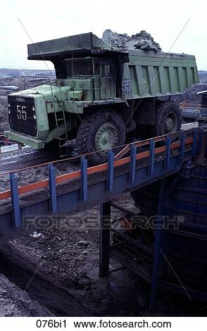 Dumper Truck unloading at an Open Cast Coal Mine Thailand View Large Photo Image Stock Image - Dumper Truck unloading at an Open Cast Coal Mine Thailand. Fotosearch