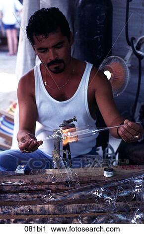 Stock Image - Glass Blower Modelling Wine glass Colombia. Fotosearch