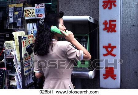 Japanese Lady on the Telephone Tokyo Japan View Large Photo Image Stock Image - Japanese Lady on the Telephone Tokyo Japan. Fotosearch