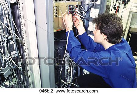 Engineer Working on Computer Network Connections View Large Photo Image Stock Image - Engineer Working on Computer Network Connections. Fotosearch