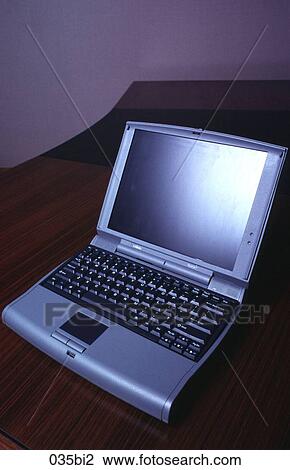 Stock Image - Laptop Computer on Desk. Fotosearch