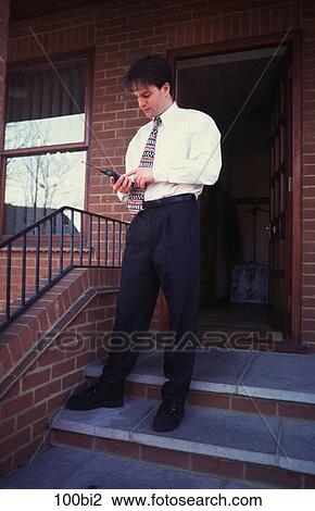Man Dialling Number on Mobile Phone View Large Photo Image Stock Image - Man Dialling Number on Mobile Phone. Fotosearch
