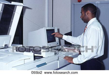 Man Standing at Docuprint Machine View Large Photo Image Stock Image - Man Standing at Docuprint Machine. Fotosearch