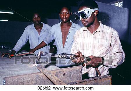 Welder Cutting Metal Bar Zimbabwe View Large Photo Image Stock Image - Welder Cutting Metal Bar Zimbabwe. Fotosearch