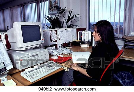 Woman Working at Desk in Office View Large Photo Image Stock Image - Woman Working at Desk in Office. Fotosearch