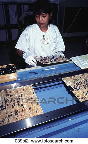 Woman Working on Production Line Manila Philippines View Large Photo Image Stock Image - Woman Working on Production Line Manila Philippines. Fotosearch