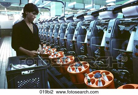 Worker at Spinning Machine in Textile Factory Pakistan View Large Photo Image Stock Image - Worker at Spinning Machine in Textile Factory Pakistan. Fotosearch