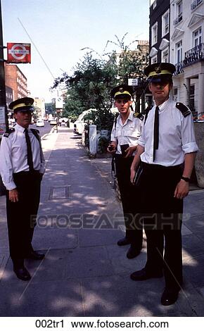Stock Image - Group of Traffic Wardens London. Fotosearch